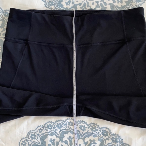 ATHLETA 22” Crop Training/running leggings with night reflective detailing trim. - Picture 2 of 12